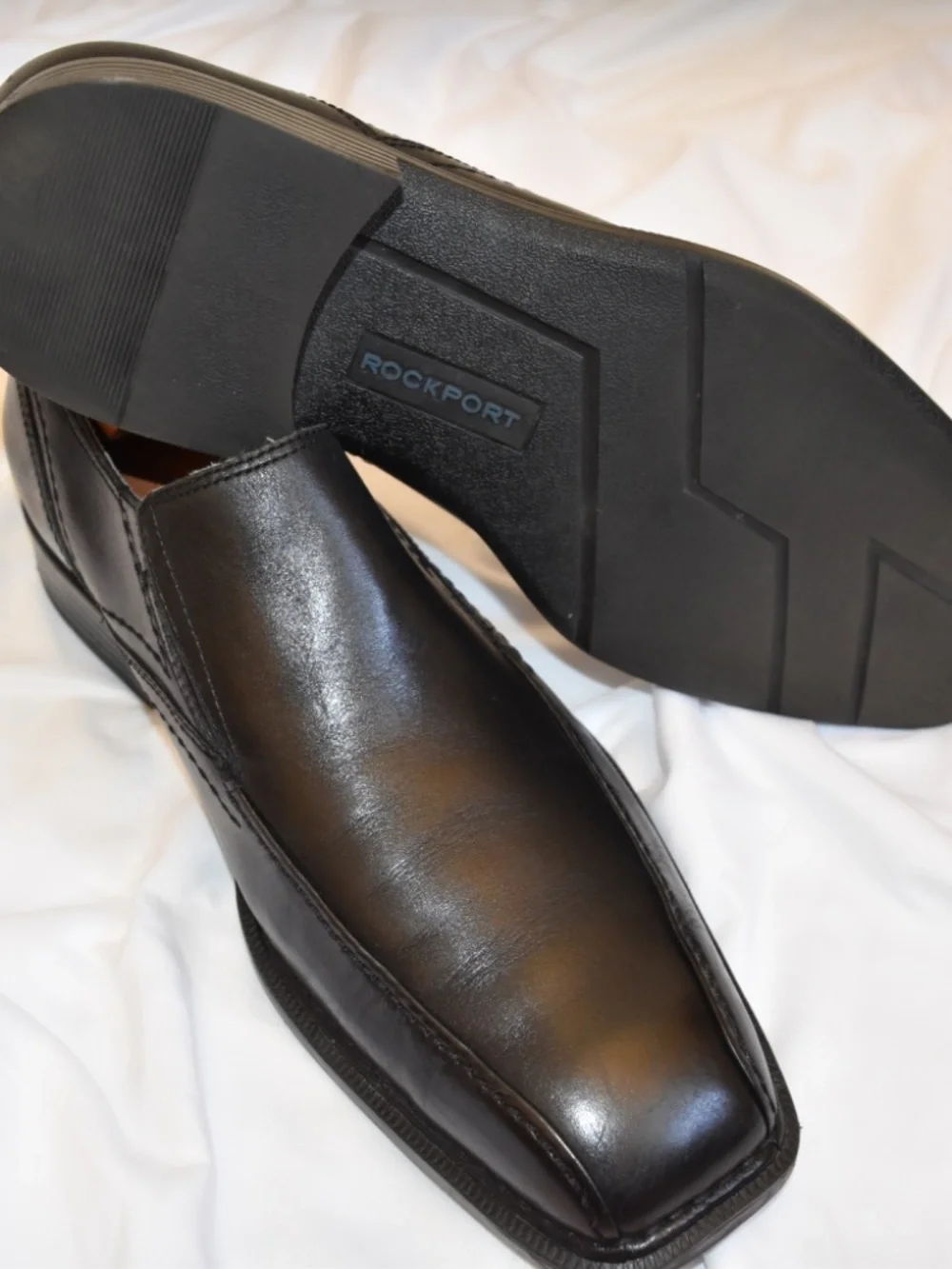 Slip on all leather black dress shoes.